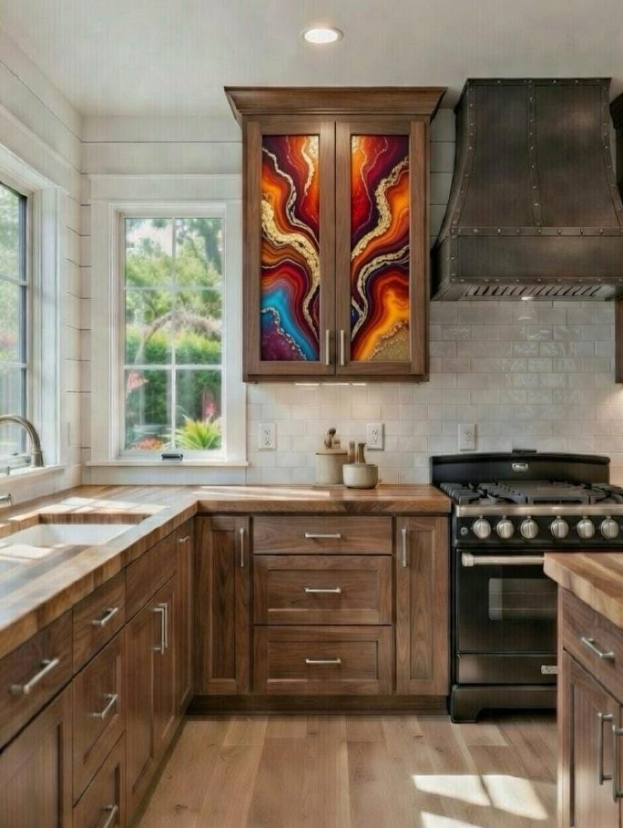 This image features a rustic-style kitchen highlighted by custom epoxy resin art panels integrated into the upper cabinet doors. 