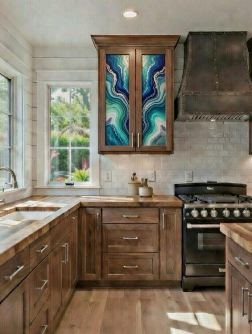 This image features a rustic-style kitchen highlighted by custom epoxy resin art panels integrated into the upper cabinet doors. 